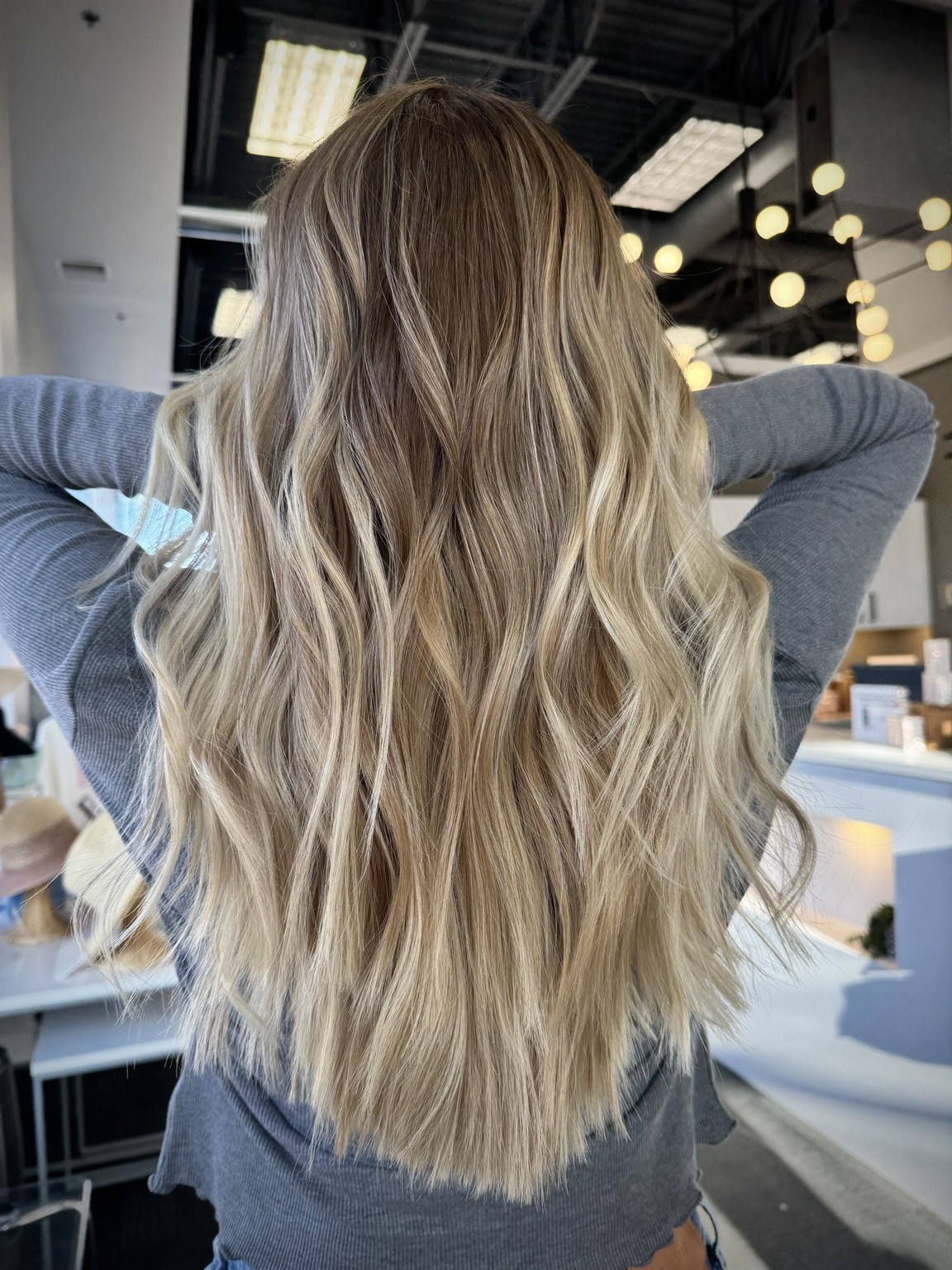 Long lived-in dimensional blonde hair with soft waves, created by Anj